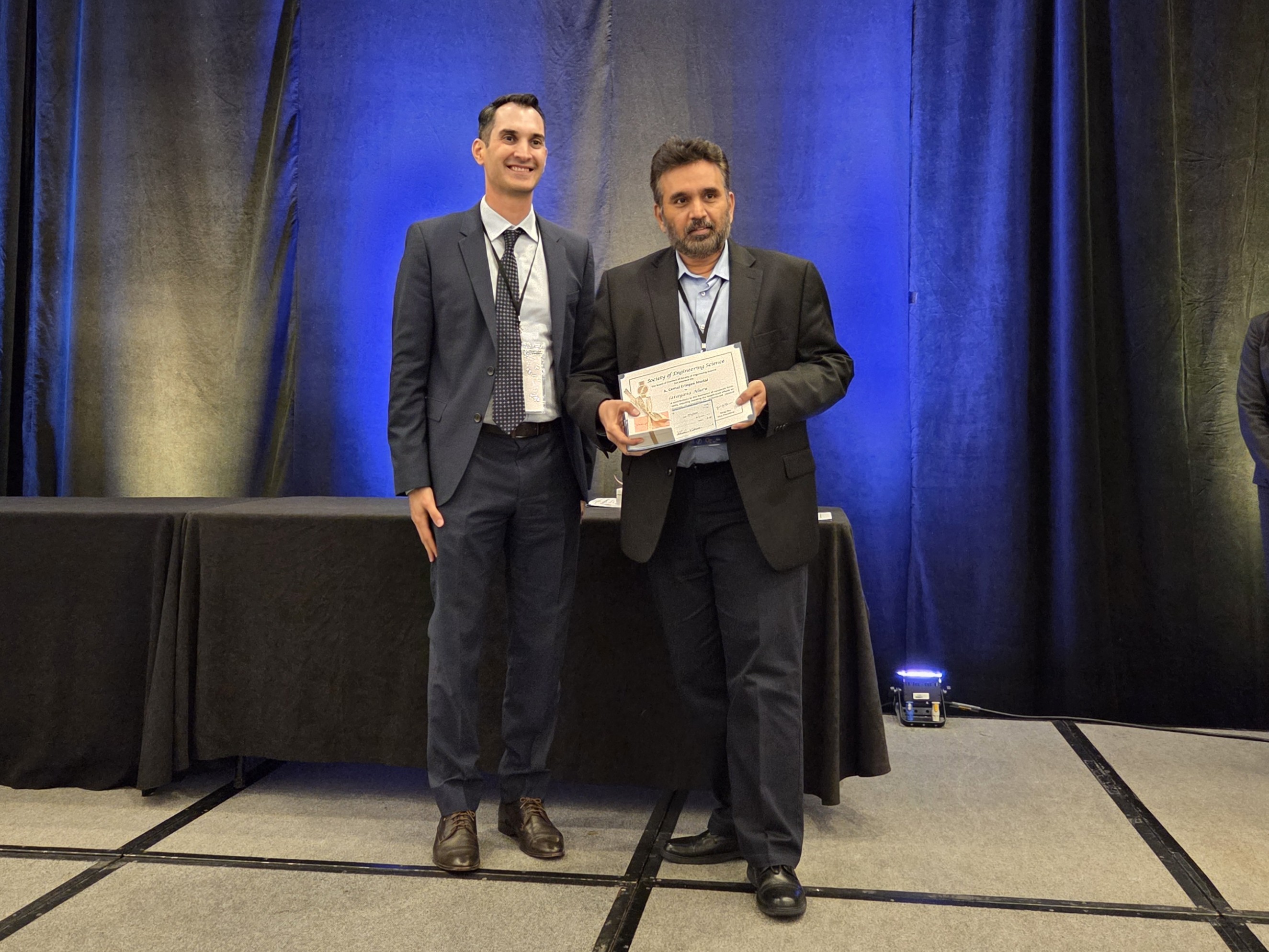 Narayana Aluru accepting the A.C. Eringen Medal during the annual conference held Oct. 12 - 15, 2025, in Atlanta, GA.