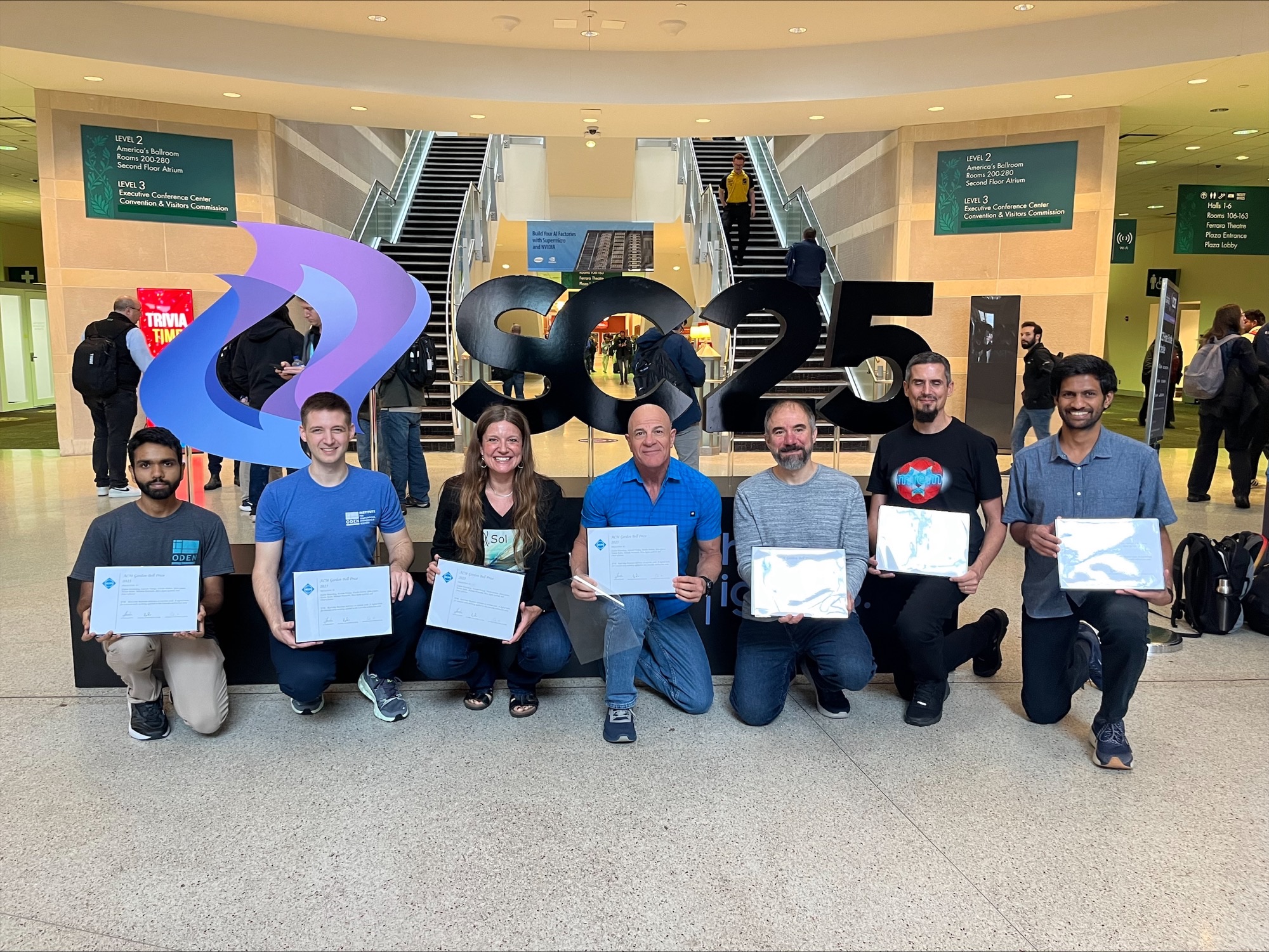 2025 ACM Gordon Bell Prize winners. The 8-member team begins from left. Credit: SC.