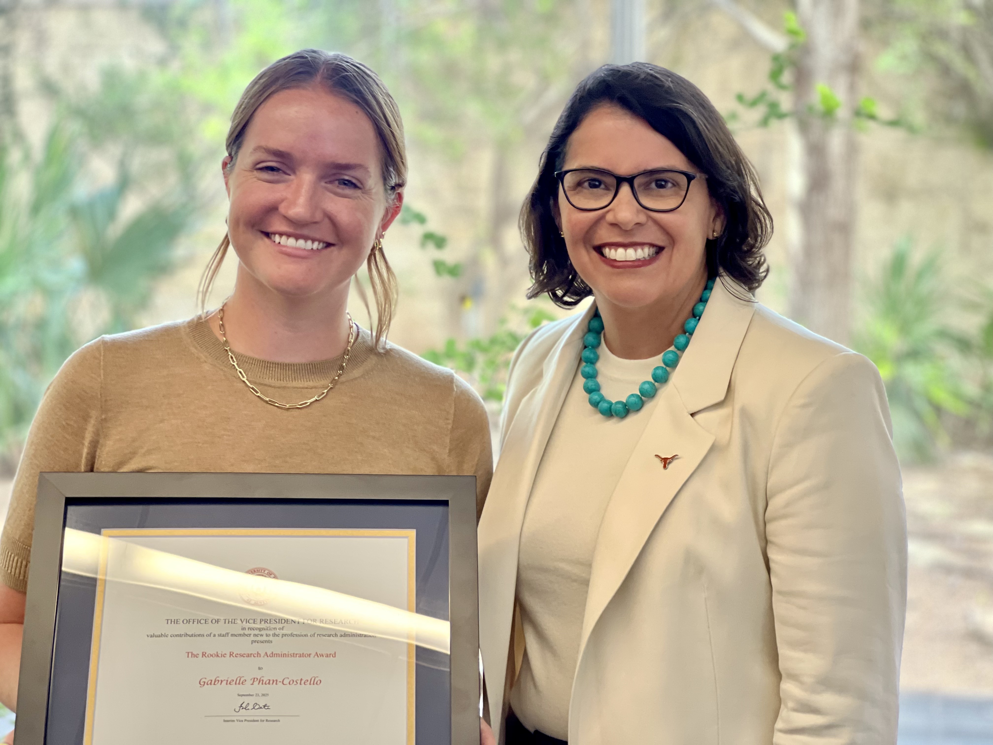 Gabrielle receiving the UT Rookie Research Administrator Award, pictured with Fernanda Leite, Interim Vice President for Research.