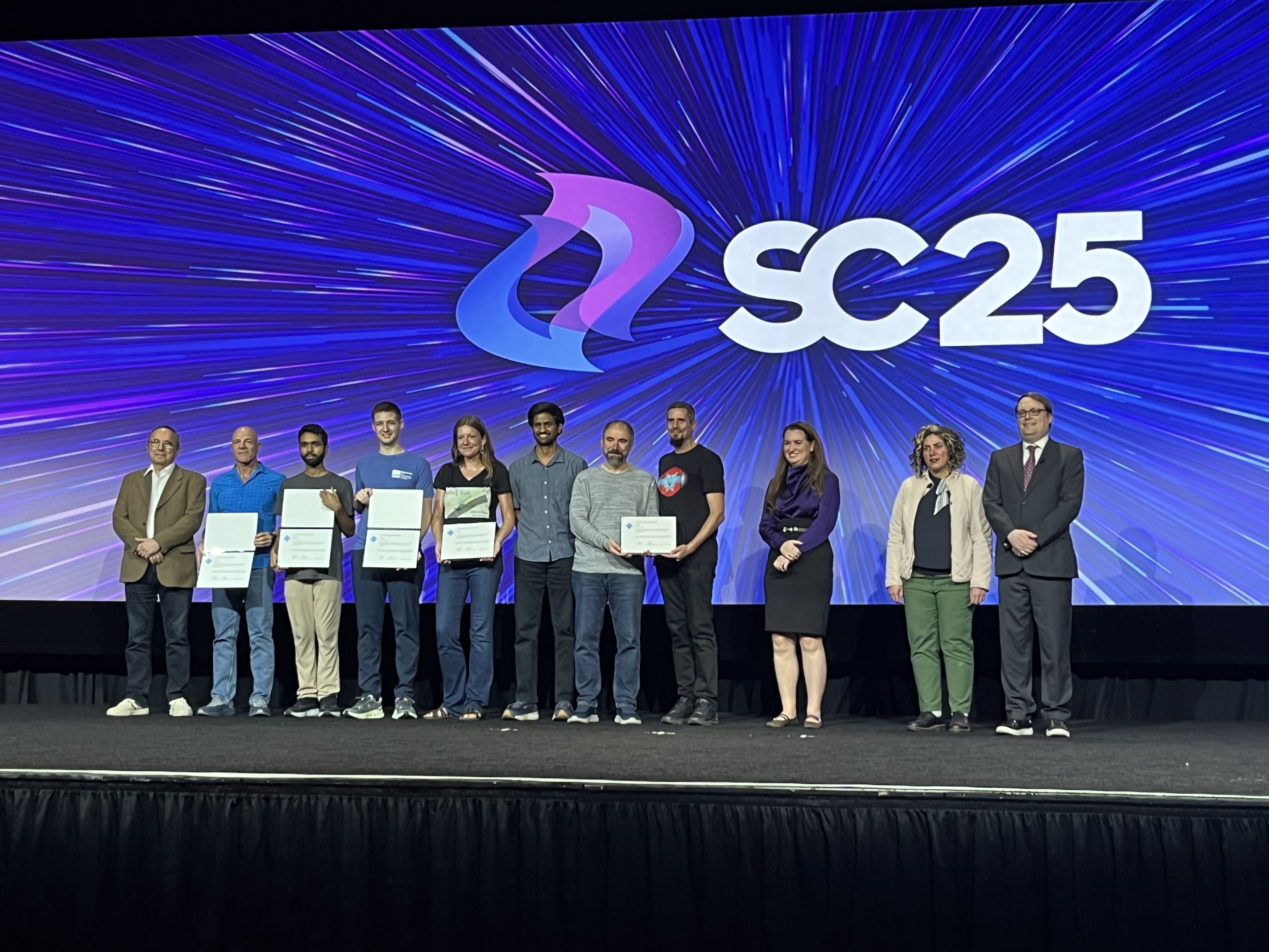 2025 ACM Gordon Bell Prize winners. The 8-member team is begins from left. Credit: LLNL.