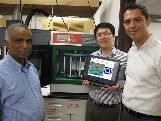 Arumugam Manthiram and researchers in his lab performed the microwave chemistry experiments while Kai Yang and Ali Yilmaz attempted to predict the outcome with computational simulations (named left to right).
